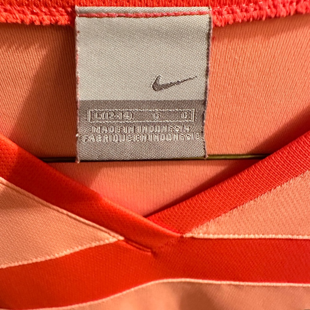 Nike size Large short sleeve shirt. Coral/ pink